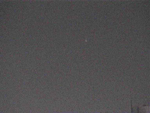 комета над городом снятая камерой 11.02.03